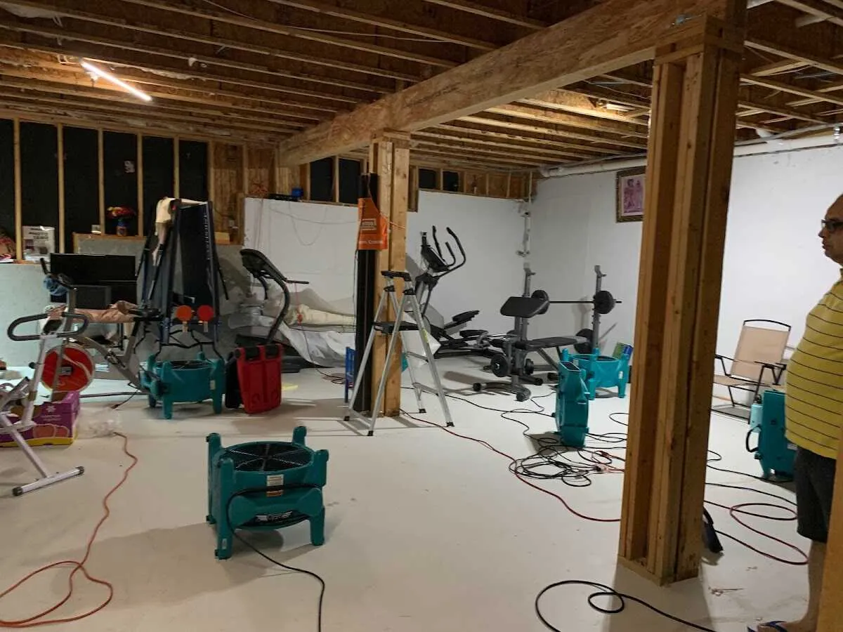 Basement drying equipment setup for Contents Cleaning & Restoration in Warrensburg